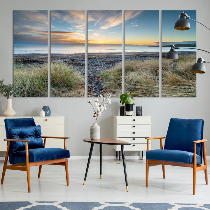 The living room features a Beach Sunset wall art canvas print gracing the wall, presented on museum-quality canvas with a UV-protective coating to ensure lasting vibrancy.