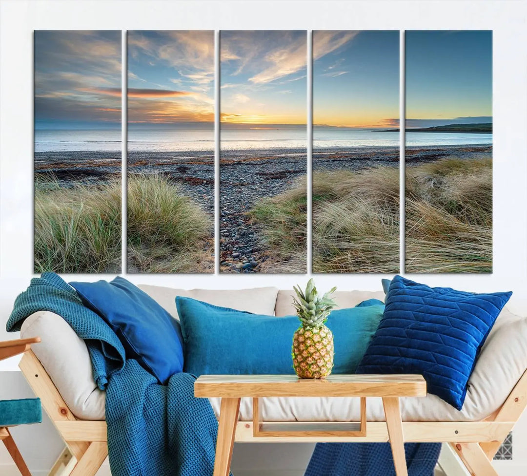 The living room features a Beach Sunset wall art canvas print gracing the wall, presented on museum-quality canvas with a UV-protective coating to ensure lasting vibrancy.