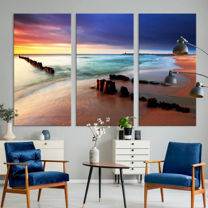 The gray wall in this living room is enhanced by a large beach triptych canvas wall art titled "Beach Sunset and Ocean Waves Canvas Wall Art, Set of 3, Seaside Serenity Coastal Decor," which captures the essence of a serene ocean scene.