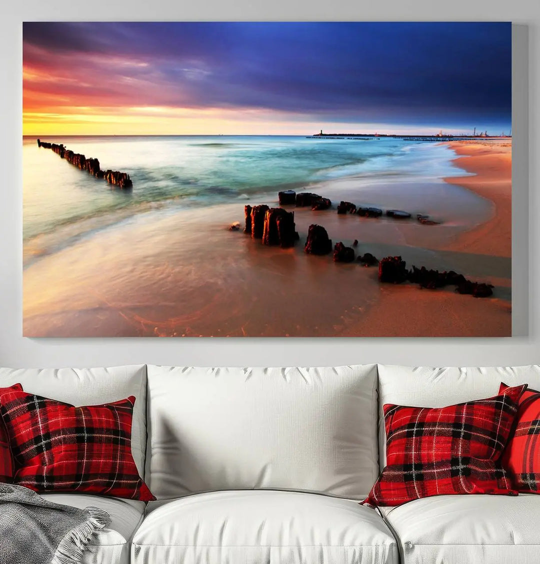 The gray wall in this living room is enhanced by a large beach triptych canvas wall art titled "Beach Sunset and Ocean Waves Canvas Wall Art, Set of 3, Seaside Serenity Coastal Decor," which captures the essence of a serene ocean scene.