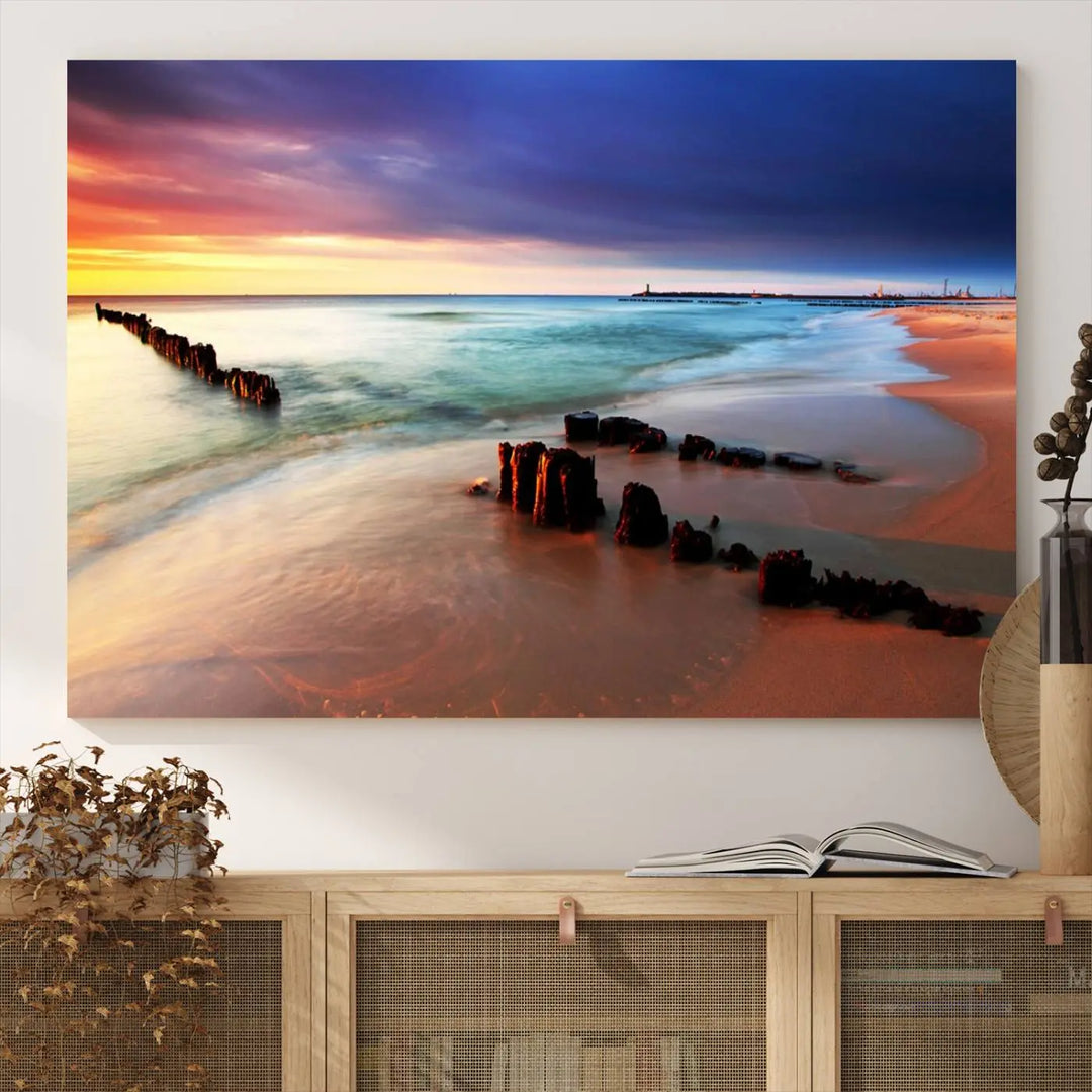 The gray wall in this living room is enhanced by a large beach triptych canvas wall art titled "Beach Sunset and Ocean Waves Canvas Wall Art, Set of 3, Seaside Serenity Coastal Decor," which captures the essence of a serene ocean scene.