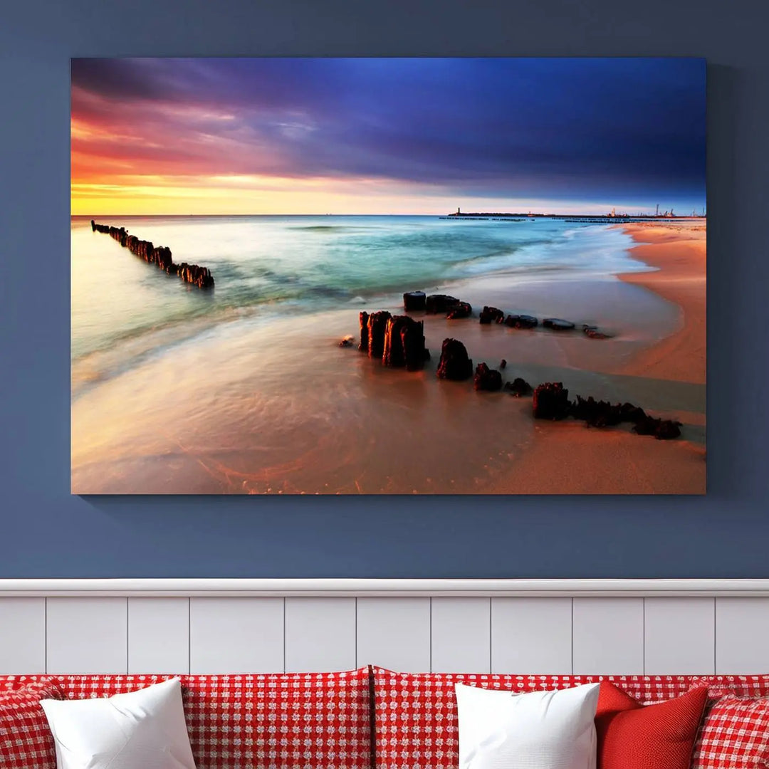 The gray wall in this living room is enhanced by a large beach triptych canvas wall art titled "Beach Sunset and Ocean Waves Canvas Wall Art, Set of 3, Seaside Serenity Coastal Decor," which captures the essence of a serene ocean scene.