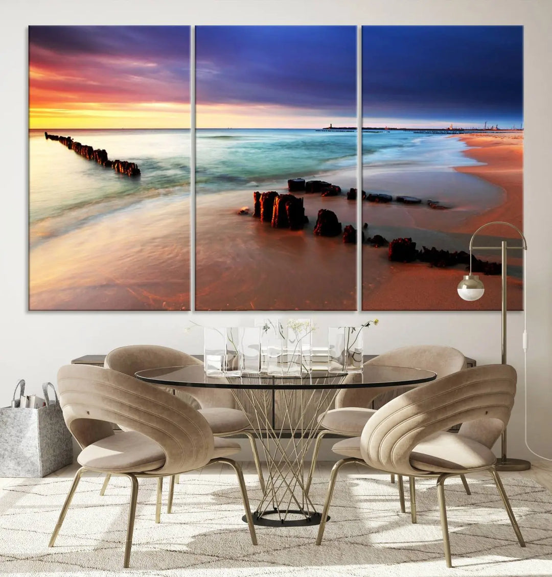 The gray wall in this living room is enhanced by a large beach triptych canvas wall art titled "Beach Sunset and Ocean Waves Canvas Wall Art, Set of 3, Seaside Serenity Coastal Decor," which captures the essence of a serene ocean scene.