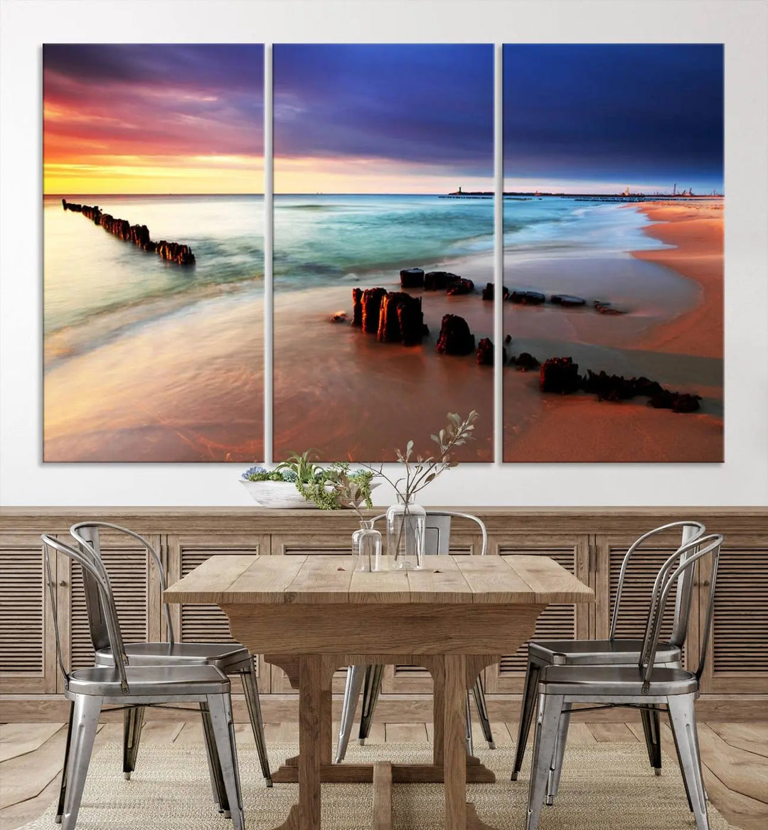 The gray wall in this living room is enhanced by a large beach triptych canvas wall art titled "Beach Sunset and Ocean Waves Canvas Wall Art, Set of 3, Seaside Serenity Coastal Decor," which captures the essence of a serene ocean scene.