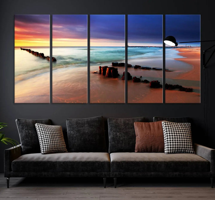 The gray wall in this living room is enhanced by a large beach triptych canvas wall art titled "Beach Sunset and Ocean Waves Canvas Wall Art, Set of 3, Seaside Serenity Coastal Decor," which captures the essence of a serene ocean scene.