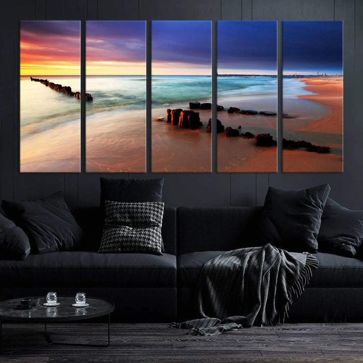 The gray wall in this living room is enhanced by a large beach triptych canvas wall art titled "Beach Sunset and Ocean Waves Canvas Wall Art, Set of 3, Seaside Serenity Coastal Decor," which captures the essence of a serene ocean scene.