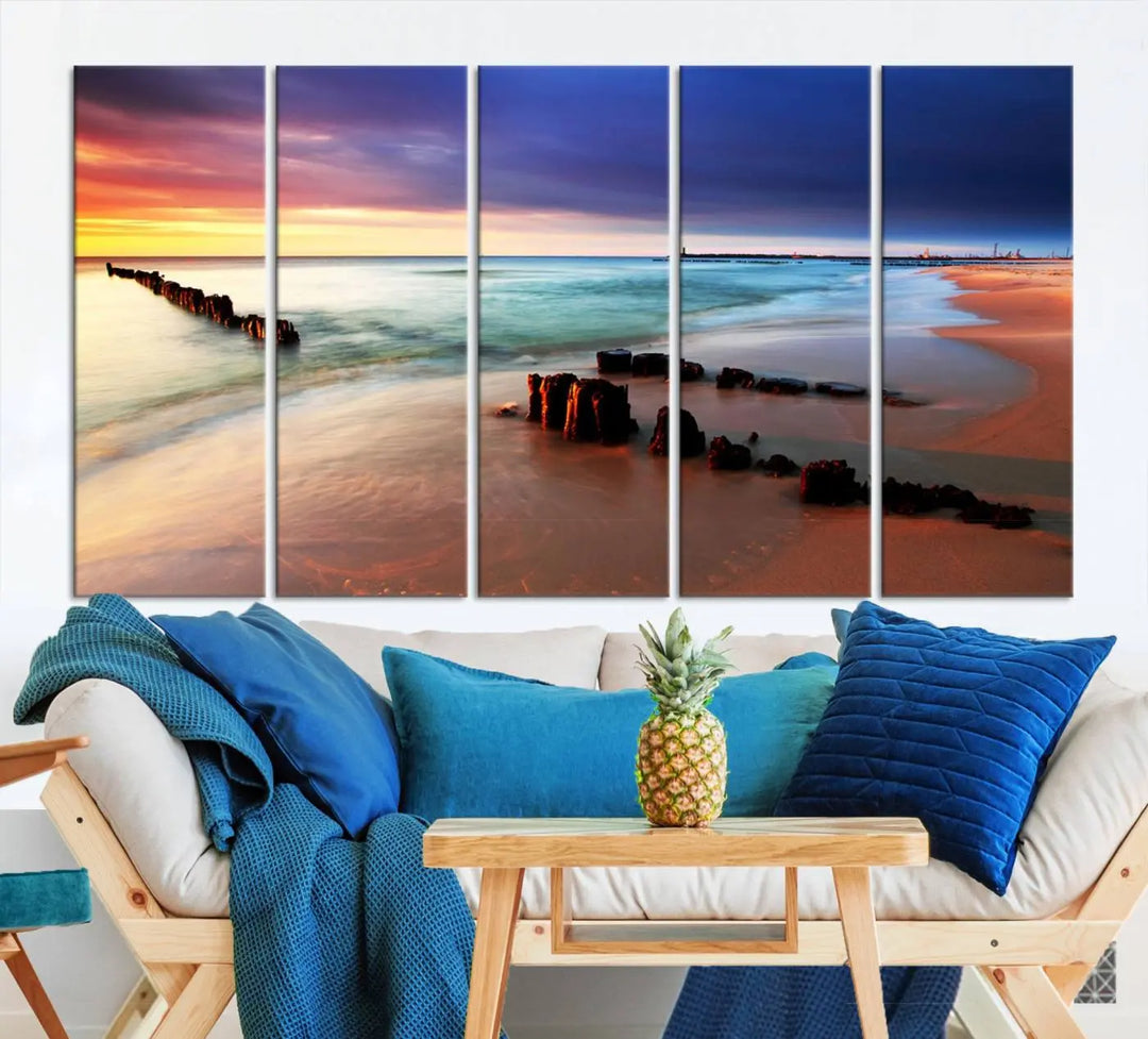 The gray wall in this living room is enhanced by a large beach triptych canvas wall art titled "Beach Sunset and Ocean Waves Canvas Wall Art, Set of 3, Seaside Serenity Coastal Decor," which captures the essence of a serene ocean scene.