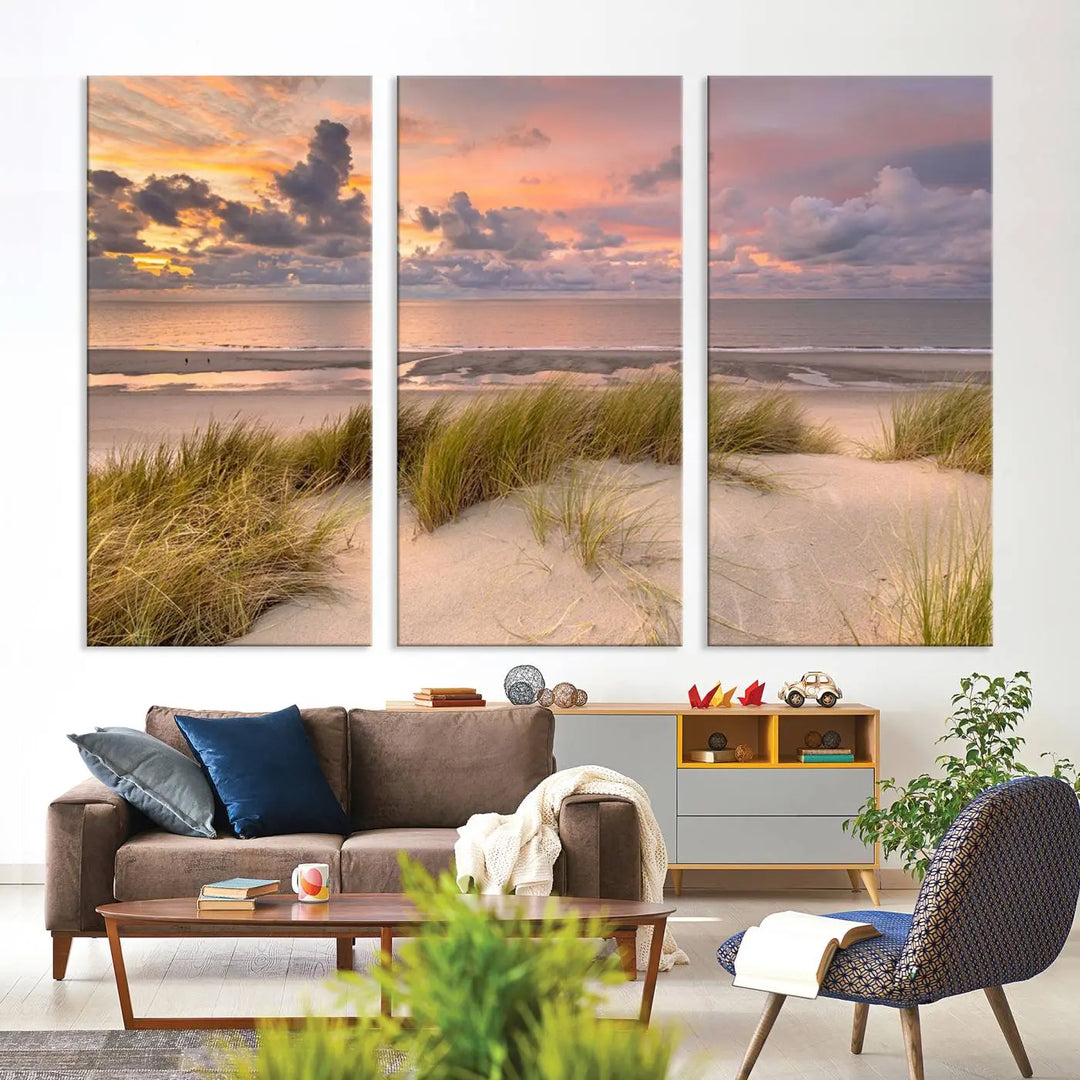 A triptych of serene sunset beach wall art graces the living room, with its museum-quality canvas accentuating the space. Each piece from the Beach Wall Art Canvas Print Sunset Artwork Print Coastal Wall Art collection comes ready to hang and features a UV-protective coating for lasting beauty.