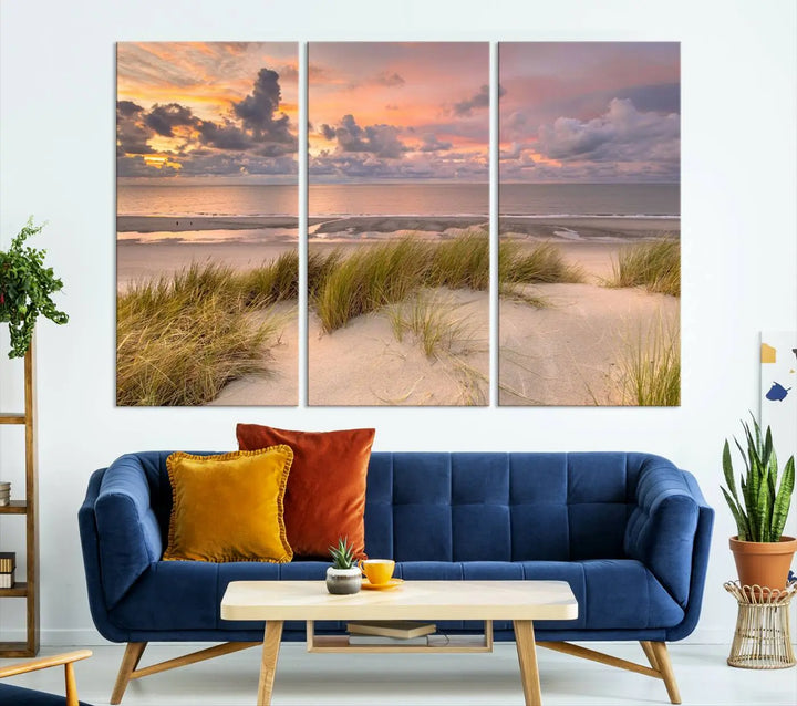 A triptych of serene sunset beach wall art graces the living room, with its museum-quality canvas accentuating the space. Each piece from the Beach Wall Art Canvas Print Sunset Artwork Print Coastal Wall Art collection comes ready to hang and features a UV-protective coating for lasting beauty.