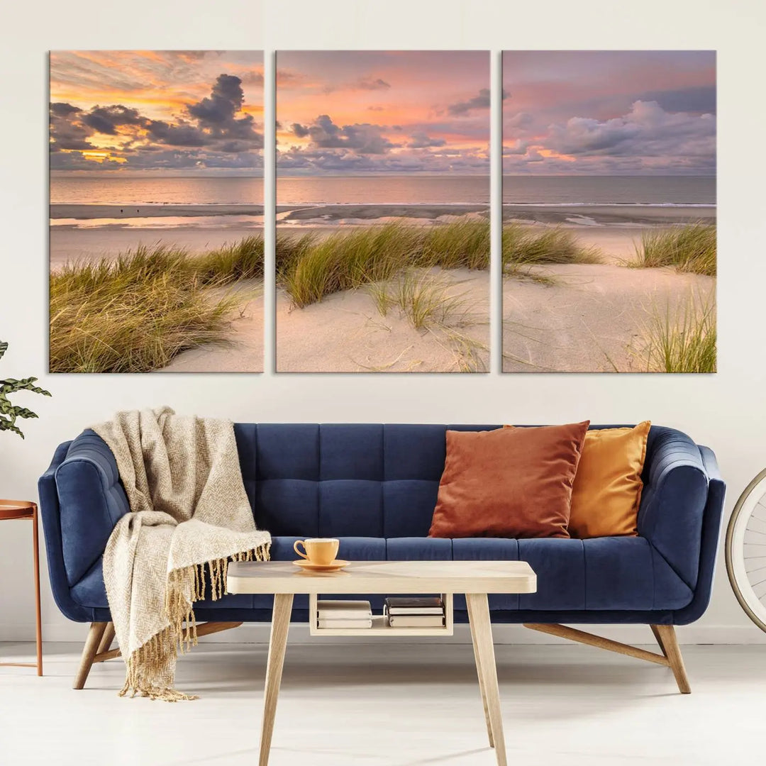 A triptych of serene sunset beach wall art graces the living room, with its museum-quality canvas accentuating the space. Each piece from the Beach Wall Art Canvas Print Sunset Artwork Print Coastal Wall Art collection comes ready to hang and features a UV-protective coating for lasting beauty.