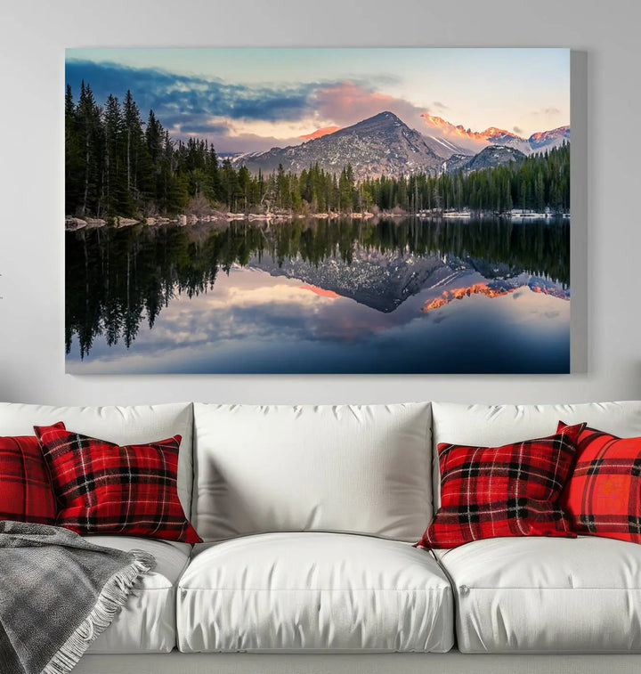 A framed canvas print titled "Bear Lake Reflections at Rocky Mountain National Park," showcasing breathtaking mountain and lake scenery at sunset, is displayed.