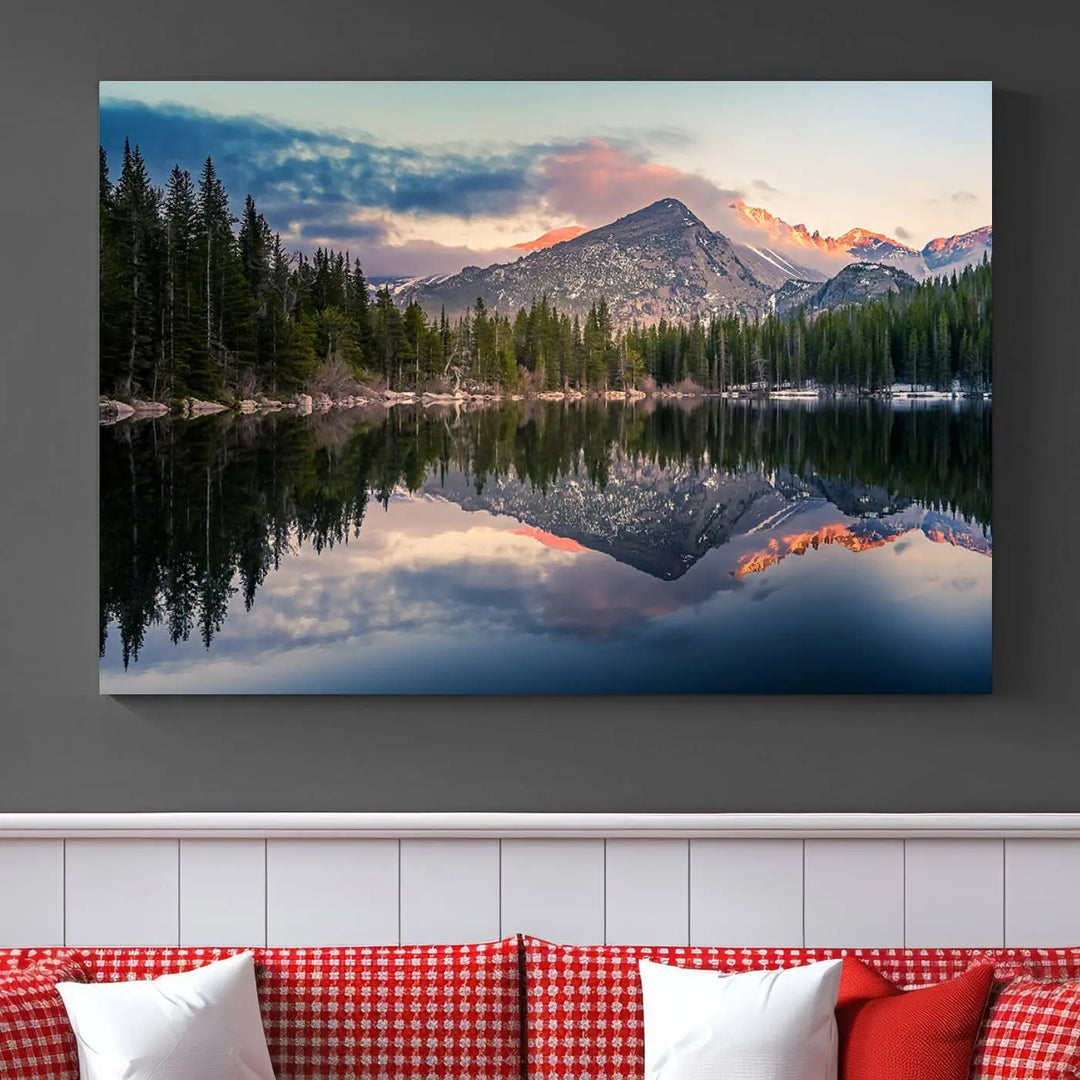 A framed canvas print titled "Bear Lake Reflections at Rocky Mountain National Park," showcasing breathtaking mountain and lake scenery at sunset, is displayed.