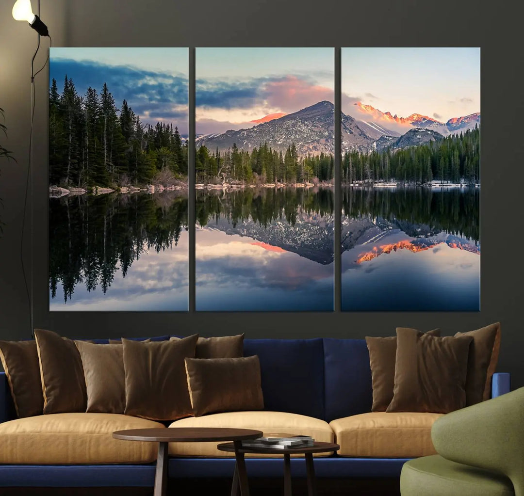 A framed canvas print titled "Bear Lake Reflections at Rocky Mountain National Park," showcasing breathtaking mountain and lake scenery at sunset, is displayed.