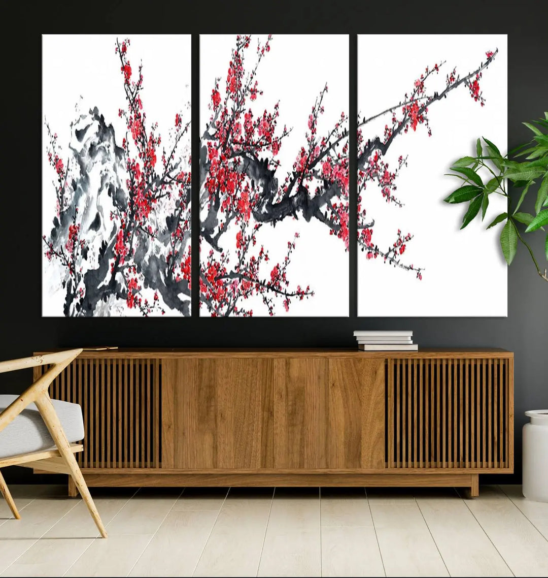 The "Beautiful Cherry Blossom Canvas Print Wall Art" showcases vibrant red cherry blossoms on a monochrome background, featuring museum-quality canvases and a gallery-wrapped finish.