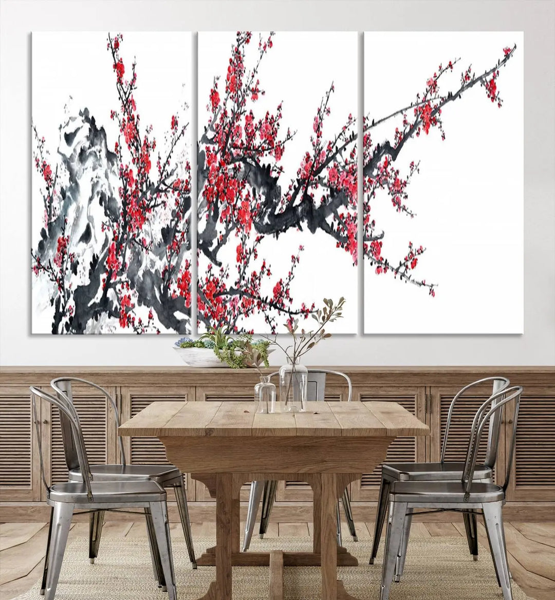 The "Beautiful Cherry Blossom Canvas Print Wall Art" showcases vibrant red cherry blossoms on a monochrome background, featuring museum-quality canvases and a gallery-wrapped finish.