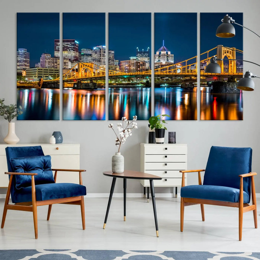 A cityscape at night showcases the illuminated beauty of Pittsburgh, with its bridge and skyscrapers casting glowing reflections on the river, all beautifully captured on this museum-quality canvas titled "Beautiful Pittsburgh Skyline Wall Art.