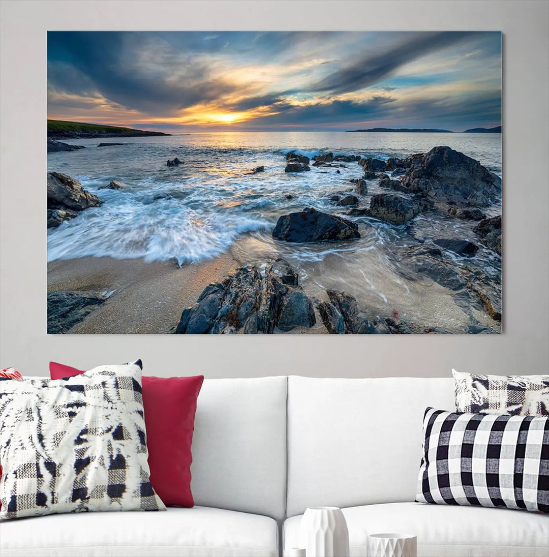 The "Beautiful Stormy Sunset at Bagh Steinigidh Beach Stones" triptych ocean-themed wall art is displayed on museum-quality canvas and features a UV-protective coating.