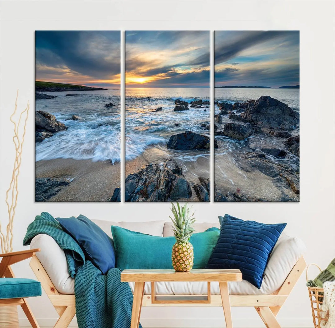 The "Beautiful Stormy Sunset at Bagh Steinigidh Beach Stones" triptych ocean-themed wall art is displayed on museum-quality canvas and features a UV-protective coating.