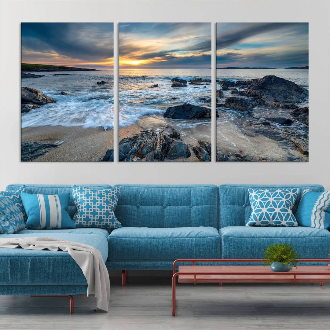 The "Beautiful Stormy Sunset at Bagh Steinigidh Beach Stones" triptych ocean-themed wall art is displayed on museum-quality canvas and features a UV-protective coating.