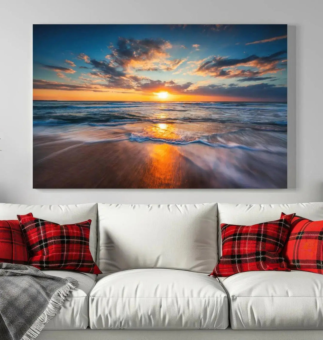 The living room showcases a triptych of the "Beautiful Sunset over the Horizon Beach" canvas wall art, crafted on museum-quality canvas with hand-assembled framing.