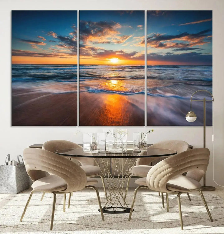 The living room showcases a triptych of the "Beautiful Sunset over the Horizon Beach" canvas wall art, crafted on museum-quality canvas with hand-assembled framing.