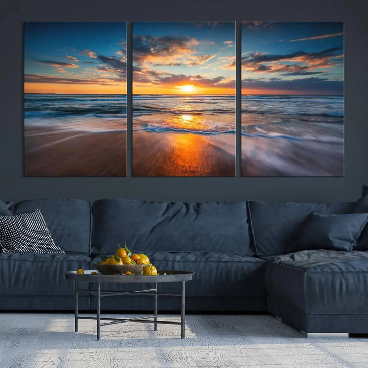 The living room showcases a triptych of the "Beautiful Sunset over the Horizon Beach" canvas wall art, crafted on museum-quality canvas with hand-assembled framing.