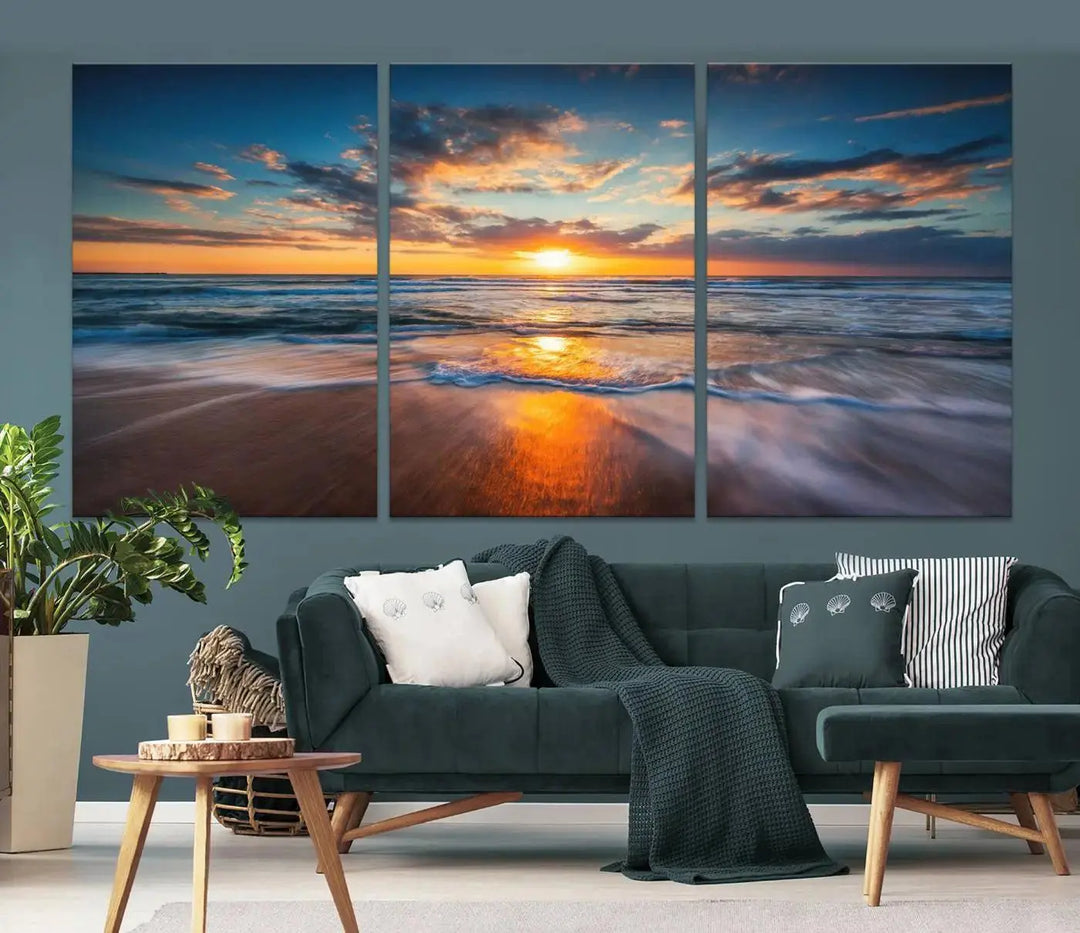 The living room showcases a triptych of the "Beautiful Sunset over the Horizon Beach" canvas wall art, crafted on museum-quality canvas with hand-assembled framing.