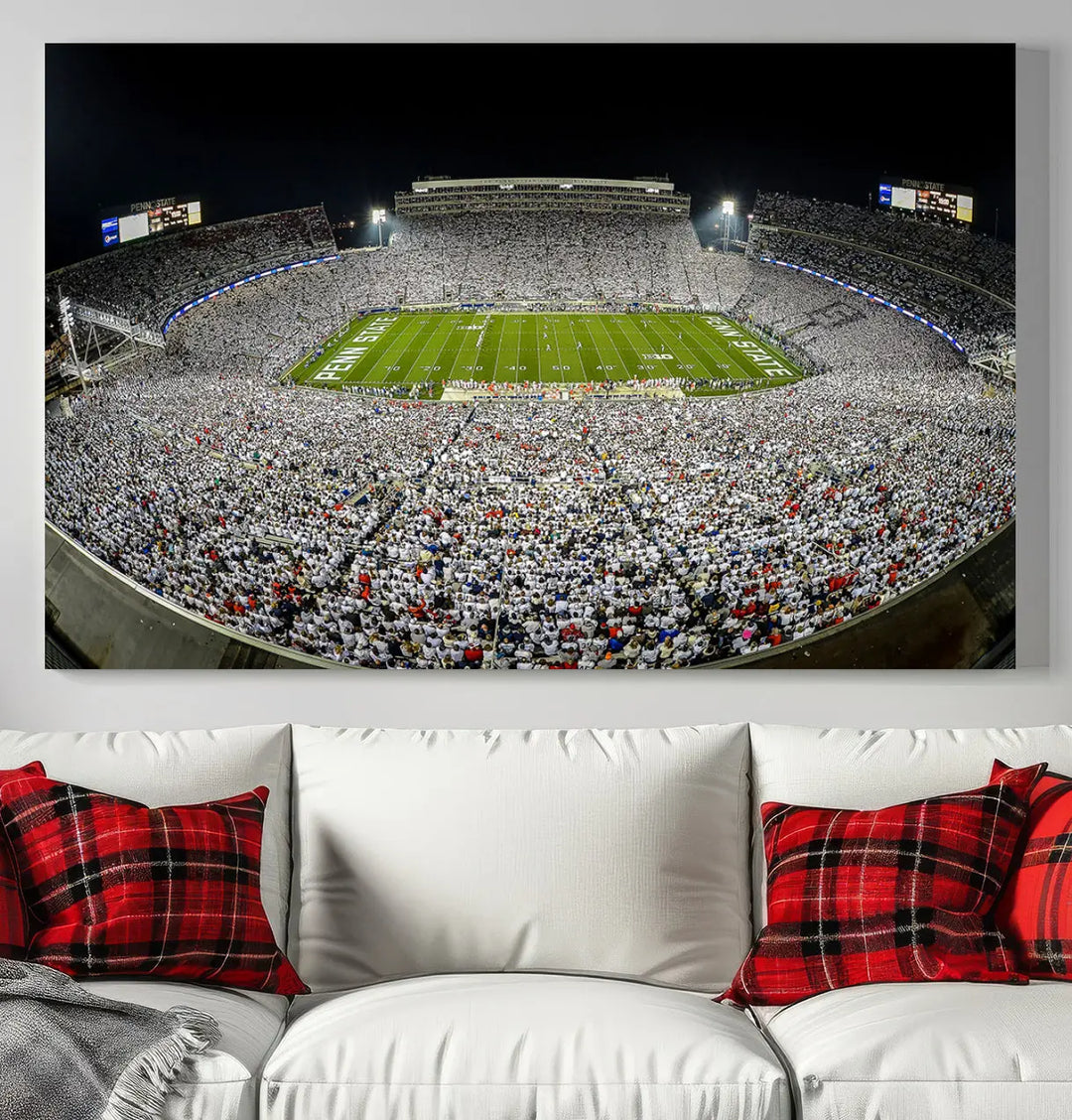 The Beaver Stadium Night Game Triple Canvas Wall Art - Penn State Nittany Lions Football Match features a panoramic view of a packed Beaver Stadium at night.