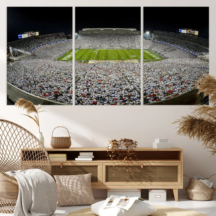 The Beaver Stadium Night Game Triple Canvas Wall Art - Penn State Nittany Lions Football Match features a panoramic view of a packed Beaver Stadium at night.