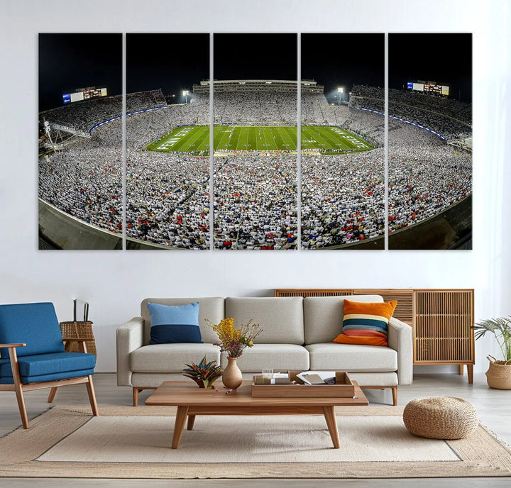 The Beaver Stadium Night Game Triple Canvas Wall Art - Penn State Nittany Lions Football Match features a panoramic view of a packed Beaver Stadium at night.