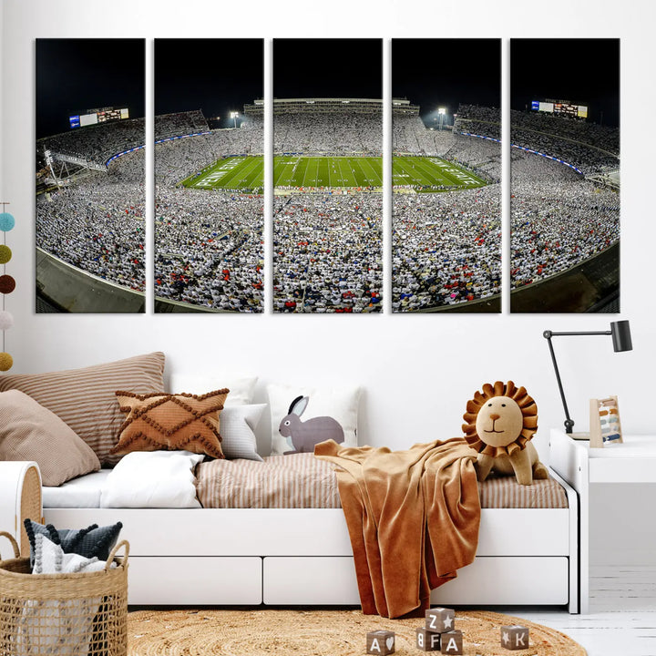 The Beaver Stadium Night Game Triple Canvas Wall Art - Penn State Nittany Lions Football Match features a panoramic view of a packed Beaver Stadium at night.