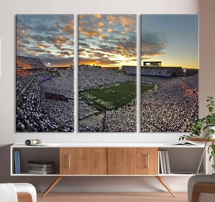 The living room features a beautifully decorated triptych of Beaver Stadium Wall Art, depicting the Penn Nittany Lions football match and capturing the vibrant energy of fans.