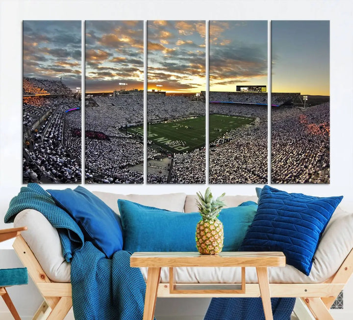 The living room features a beautifully decorated triptych of Beaver Stadium Wall Art, depicting the Penn Nittany Lions football match and capturing the vibrant energy of fans.