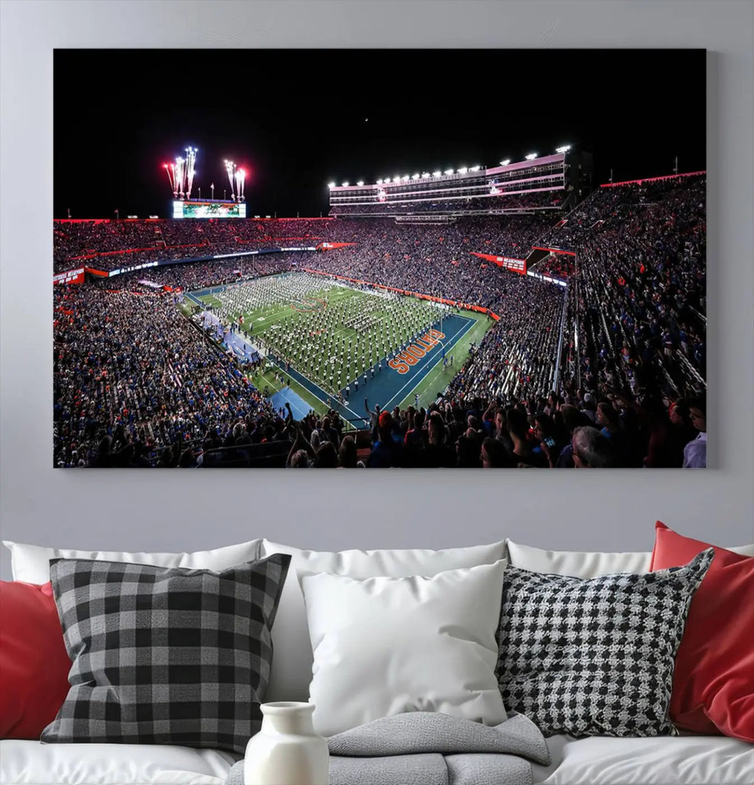 The Ben Hill Griffin Stadium Night Game Triple Canvas Wall Art - Florida Gators Football Match beautifully embodies the essence of a night game at the stadium, featuring fans, fireworks, and a marching band. This artwork is an ideal addition to a modern living room for any Florida Gators fan.