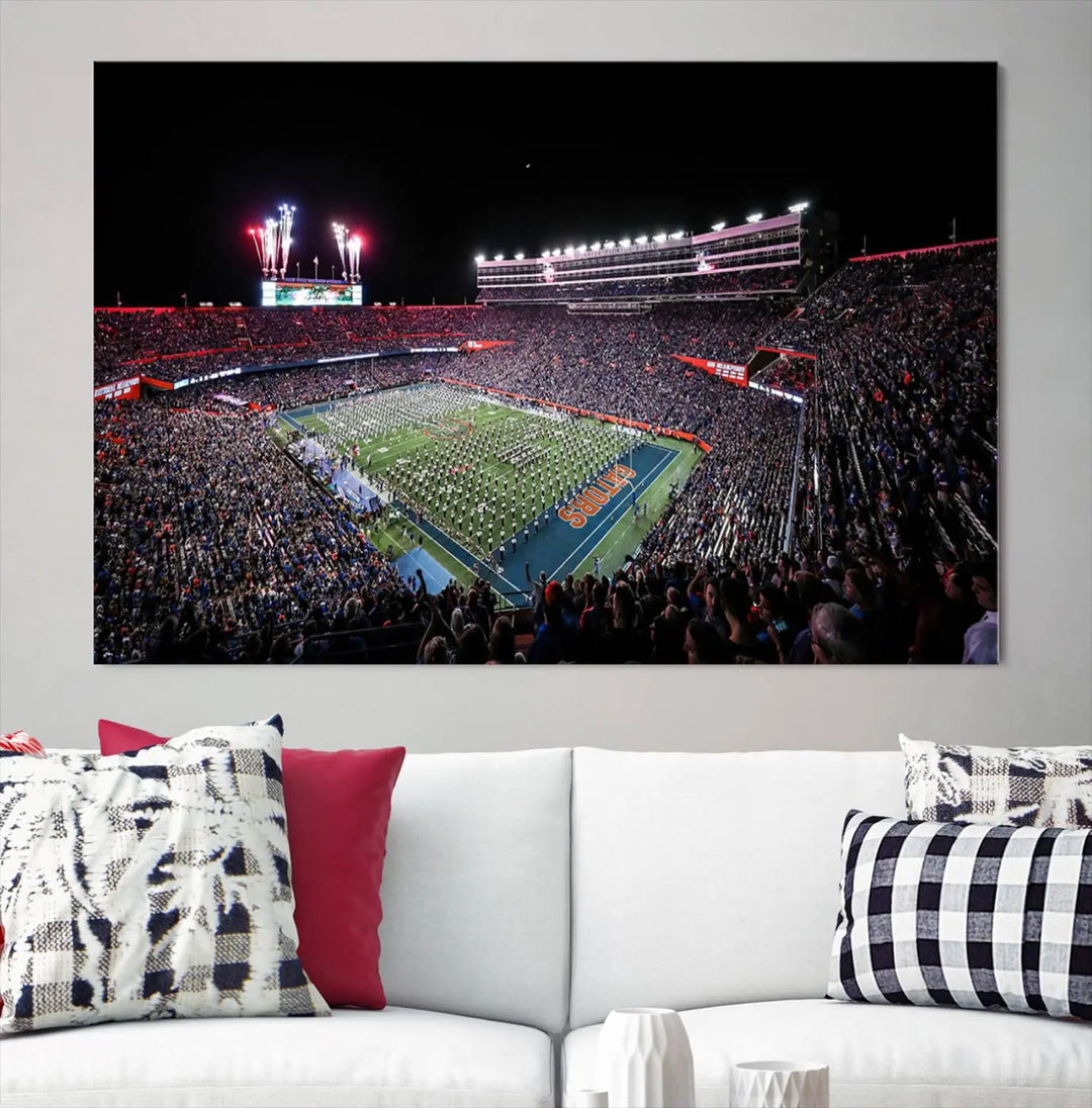 The Ben Hill Griffin Stadium Night Game Triple Canvas Wall Art - Florida Gators Football Match beautifully embodies the essence of a night game at the stadium, featuring fans, fireworks, and a marching band. This artwork is an ideal addition to a modern living room for any Florida Gators fan.