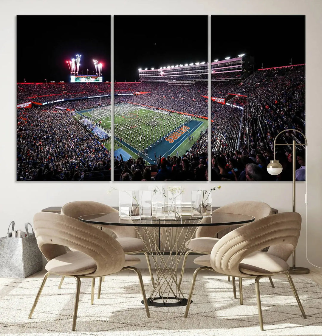 The Ben Hill Griffin Stadium Night Game Triple Canvas Wall Art - Florida Gators Football Match beautifully embodies the essence of a night game at the stadium, featuring fans, fireworks, and a marching band. This artwork is an ideal addition to a modern living room for any Florida Gators fan.