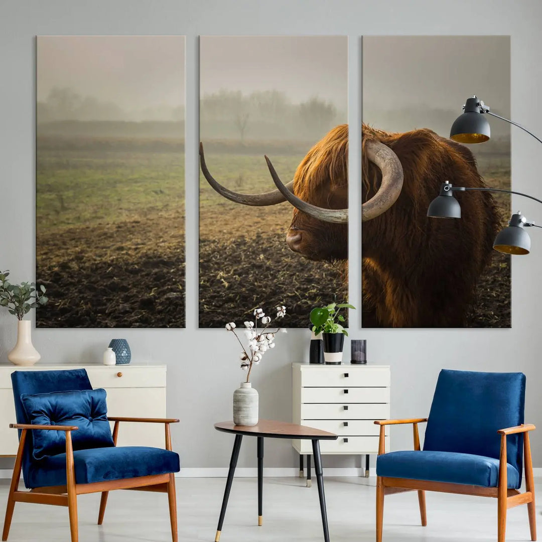 The "Big Cow Horn Wall Art Canvas Print" is a hand-assembled framed canvas depicting a Highland cow in a misty field. It is crafted with a UV-protective coating to ensure lasting vibrancy.