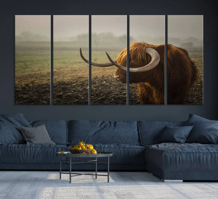 The "Big Cow Horn Wall Art Canvas Print" is a hand-assembled framed canvas depicting a Highland cow in a misty field. It is crafted with a UV-protective coating to ensure lasting vibrancy.