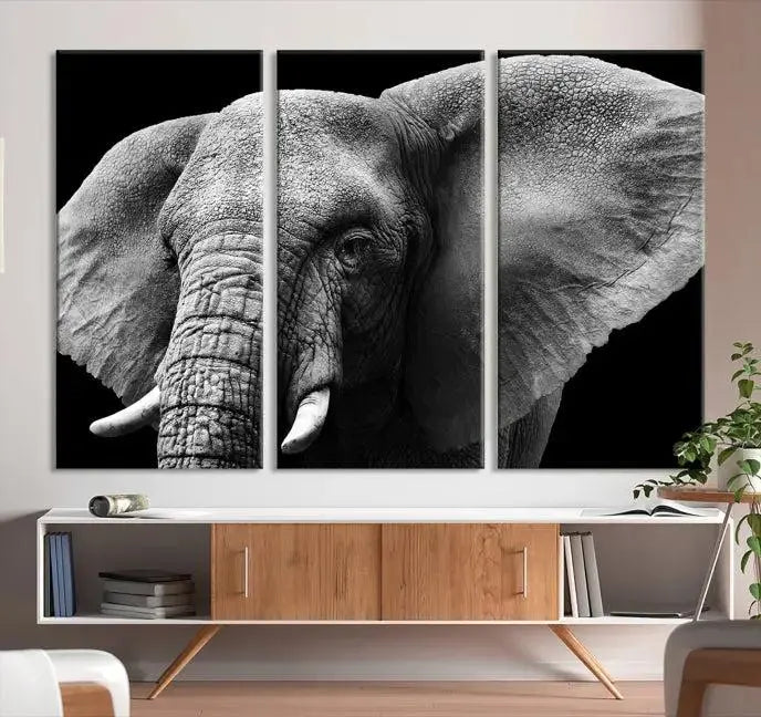 The "Big Elephant Close Up Wall Art Canvas Print" showcases a striking black and white elephant design. Printed on museum-quality canvas with a UV-protective coating, it is ready to hang and effortlessly combines elegance and style in any room.