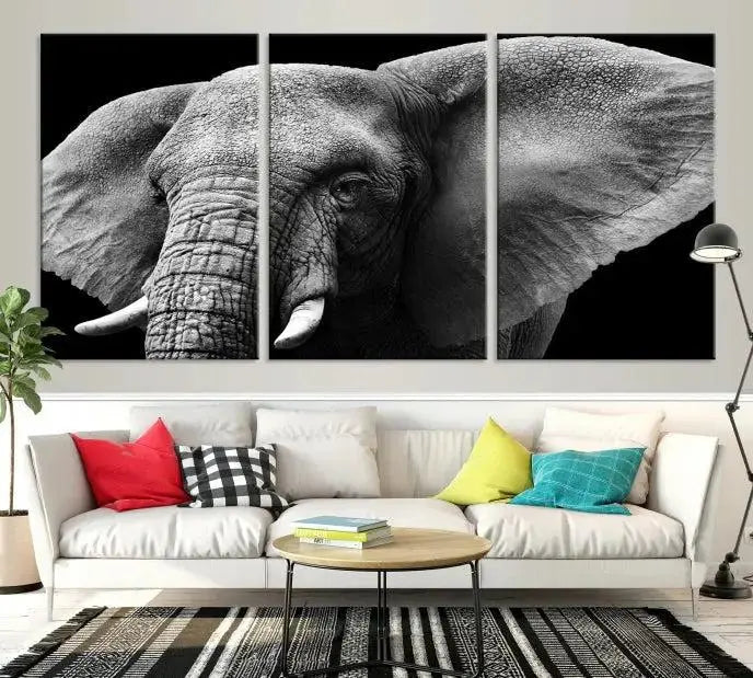 The "Big Elephant Close Up Wall Art Canvas Print" showcases a striking black and white elephant design. Printed on museum-quality canvas with a UV-protective coating, it is ready to hang and effortlessly combines elegance and style in any room.