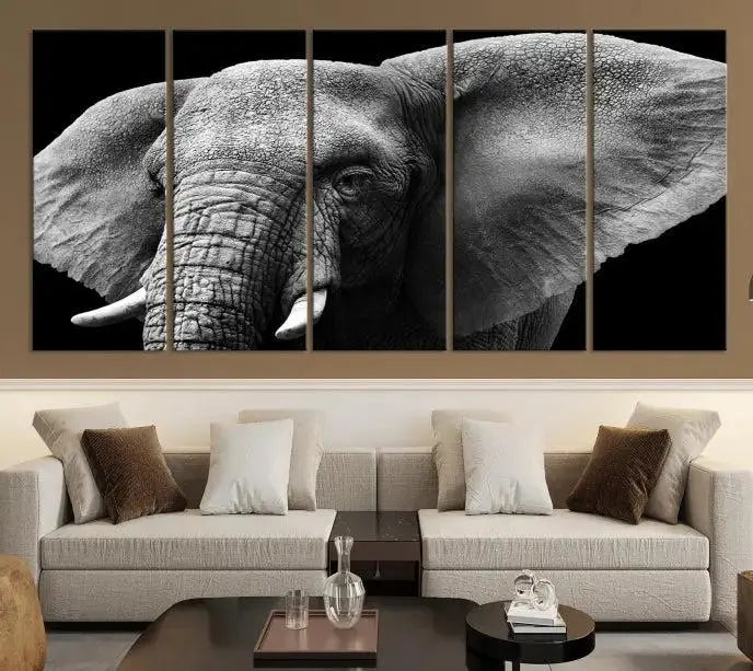 The "Big Elephant Close Up Wall Art Canvas Print" showcases a striking black and white elephant design. Printed on museum-quality canvas with a UV-protective coating, it is ready to hang and effortlessly combines elegance and style in any room.