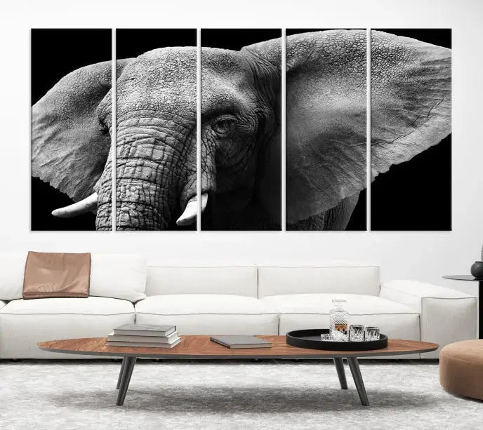 The "Big Elephant Close Up Wall Art Canvas Print" showcases a striking black and white elephant design. Printed on museum-quality canvas with a UV-protective coating, it is ready to hang and effortlessly combines elegance and style in any room.