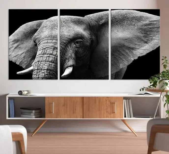 The "Big Elephant Close Up Wall Art Canvas Print" showcases a striking black and white elephant design. Printed on museum-quality canvas with a UV-protective coating, it is ready to hang and effortlessly combines elegance and style in any room.