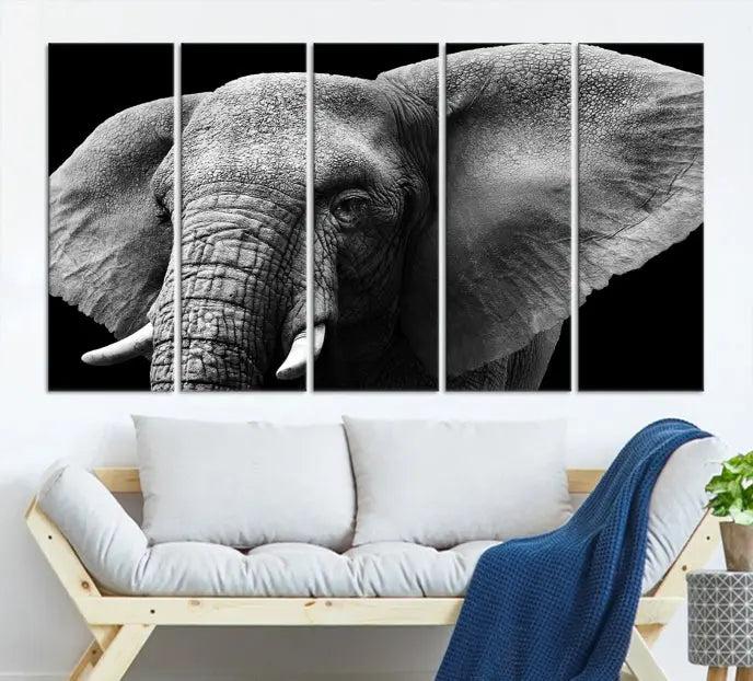 The "Big Elephant Close Up Wall Art Canvas Print" showcases a striking black and white elephant design. Printed on museum-quality canvas with a UV-protective coating, it is ready to hang and effortlessly combines elegance and style in any room.