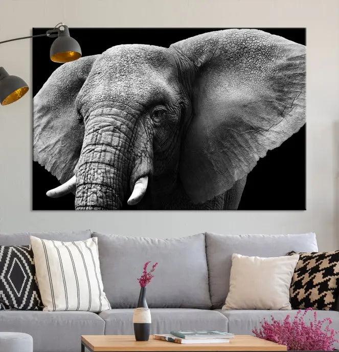 The "Big Elephant Close Up Wall Art Canvas Print" showcases a striking black and white elephant design. Printed on museum-quality canvas with a UV-protective coating, it is ready to hang and effortlessly combines elegance and style in any room.