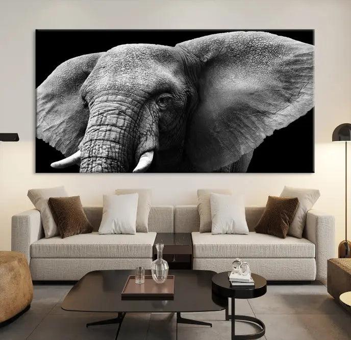 The "Big Elephant Close Up Wall Art Canvas Print" showcases a striking black and white elephant design. Printed on museum-quality canvas with a UV-protective coating, it is ready to hang and effortlessly combines elegance and style in any room.