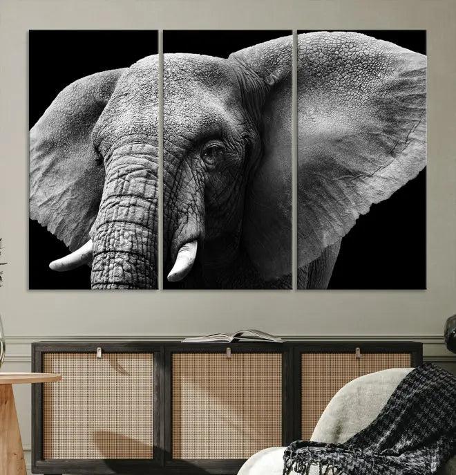 The "Big Elephant Close Up Wall Art Canvas Print" showcases a striking black and white elephant design. Printed on museum-quality canvas with a UV-protective coating, it is ready to hang and effortlessly combines elegance and style in any room.