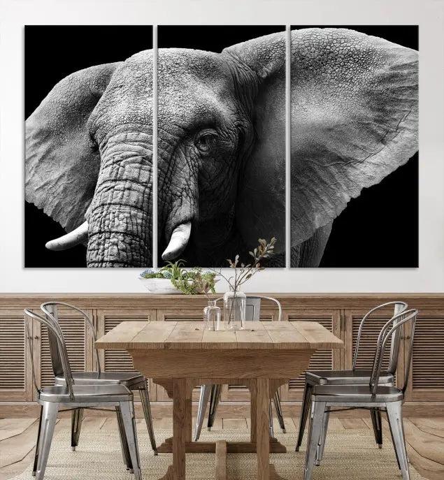 The "Big Elephant Close Up Wall Art Canvas Print" showcases a striking black and white elephant design. Printed on museum-quality canvas with a UV-protective coating, it is ready to hang and effortlessly combines elegance and style in any room.