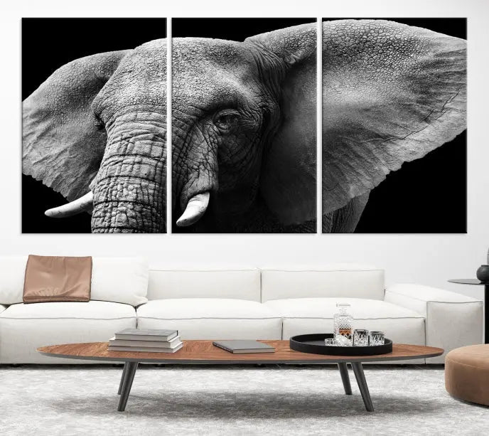 The "Big Elephant Close Up Wall Art Canvas Print" showcases a striking black and white elephant design. Printed on museum-quality canvas with a UV-protective coating, it is ready to hang and effortlessly combines elegance and style in any room.