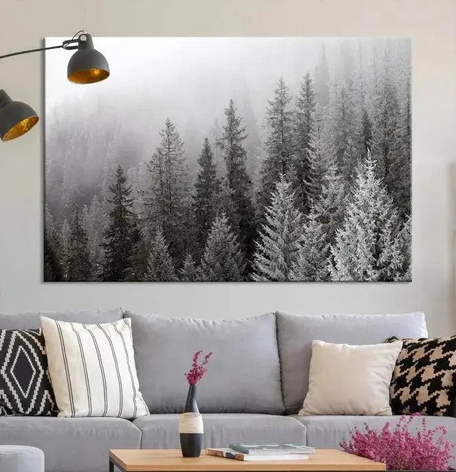 The living room's wall is adorned with the "Big Foggy Forest and Misty Trees Forest Wall Art Canvas Print," which adds an elegant touch to the space.